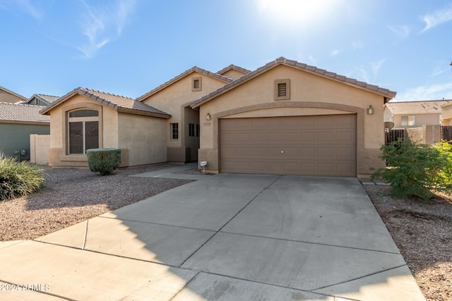 view of front of property with a garage