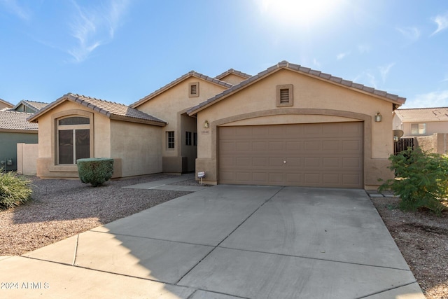 view of front of property with a garage