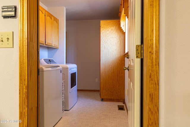2806 Skyhawk Dr, Overgaard, AZ 85933 - washroom with washer and clothes dryer, cabinet space, and light floors