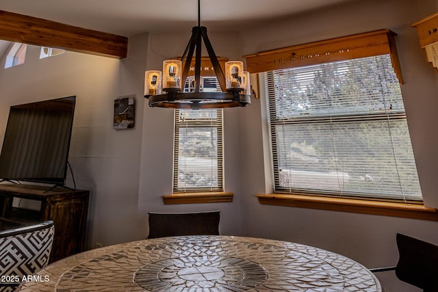 2806 Skyhawk Dr, Overgaard, AZ 85933 - dining space with a chandelier and beamed ceiling
