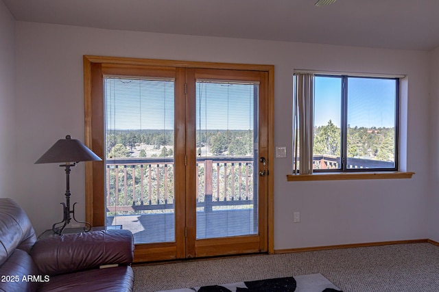 2806 Skyhawk Dr, Overgaard, AZ 85933 - doorway to outside with carpet and baseboards
