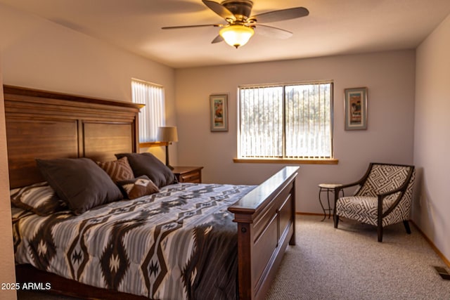 2806 Skyhawk Dr, Overgaard, AZ 85933 - carpeted bedroom with multiple windows, a ceiling fan, and baseboards