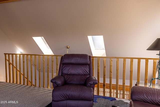 2806 Skyhawk Dr, Overgaard, AZ 85933 - living area featuring a skylight, carpet flooring, an upstairs landing, and vaulted ceiling