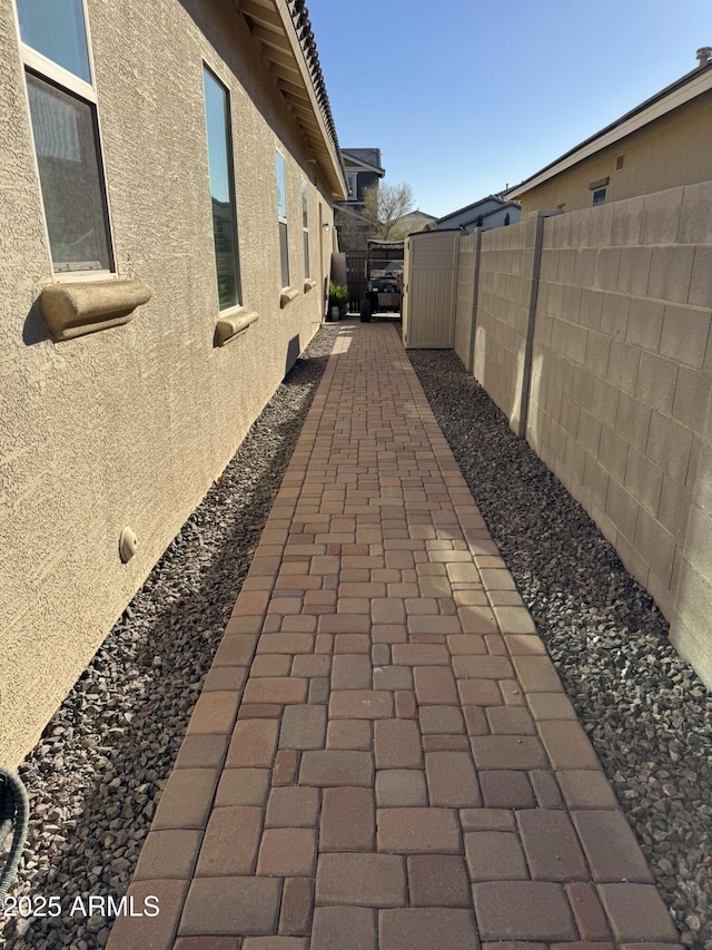 view of property exterior featuring a patio