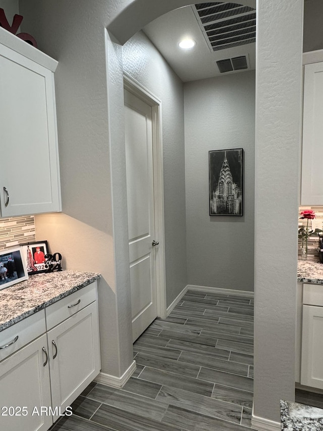 interior space featuring decorative backsplash