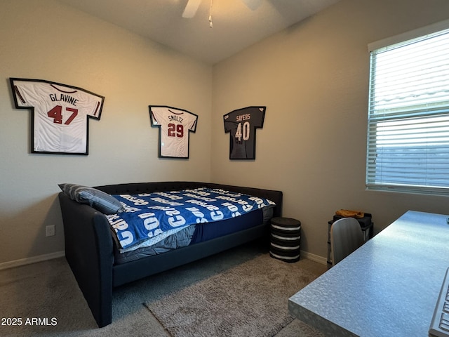 bedroom featuring ceiling fan and carpet flooring