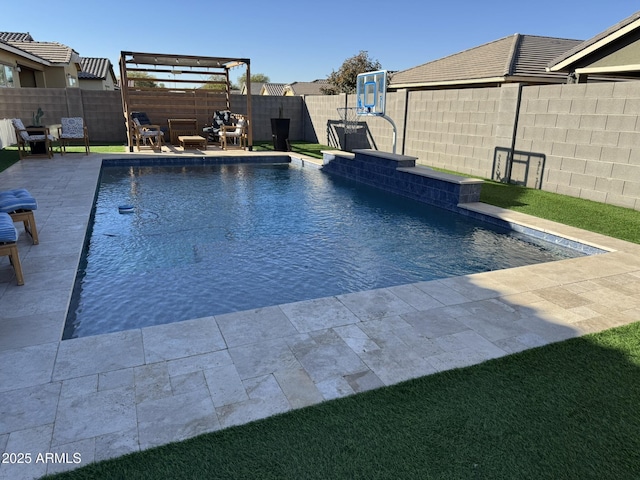 view of pool featuring a patio