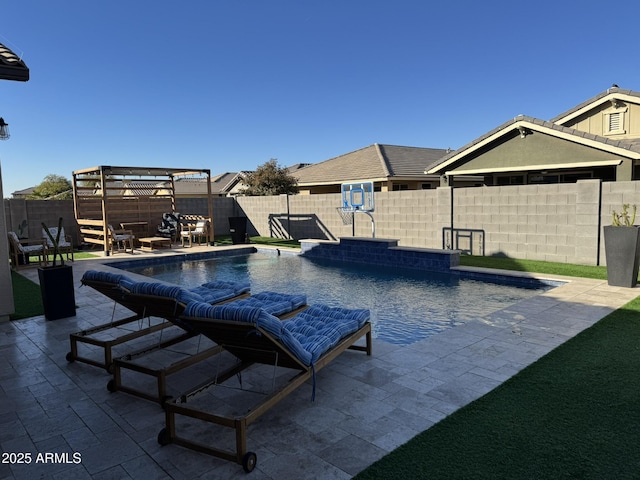 view of swimming pool with a patio