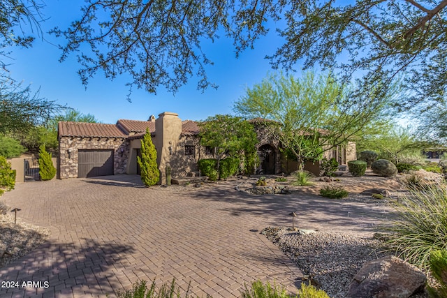 view of front of home with a garage