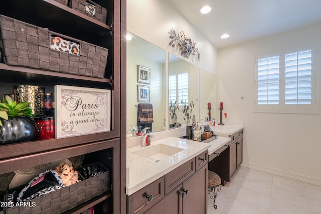 bathroom featuring vanity and tile patterned flooring