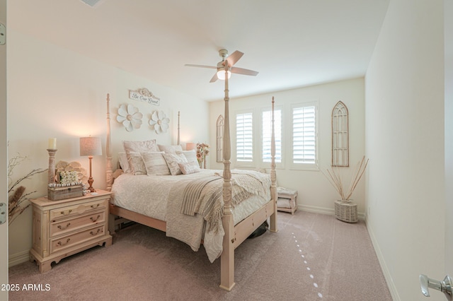 bedroom with light colored carpet and ceiling fan