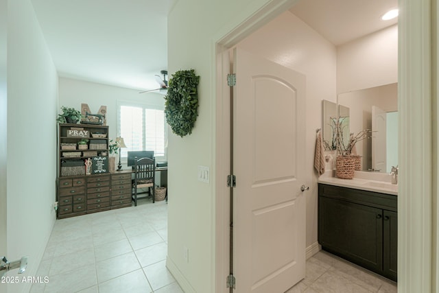 bathroom featuring tile patterned floors and vanity