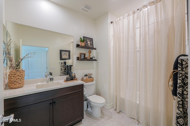 full bathroom featuring vanity, toilet, tile patterned flooring, and shower / bath combo with shower curtain