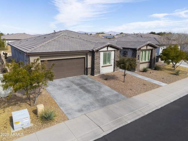 ranch-style home featuring a garage