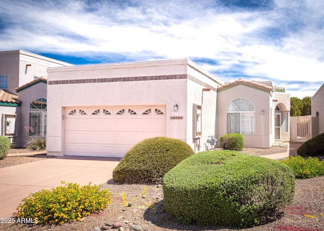 4484 Desert Springs Trl, Sierra Vista, AZ 85635 - view of front of home featuring driveway, an attached garage, and stucco siding
