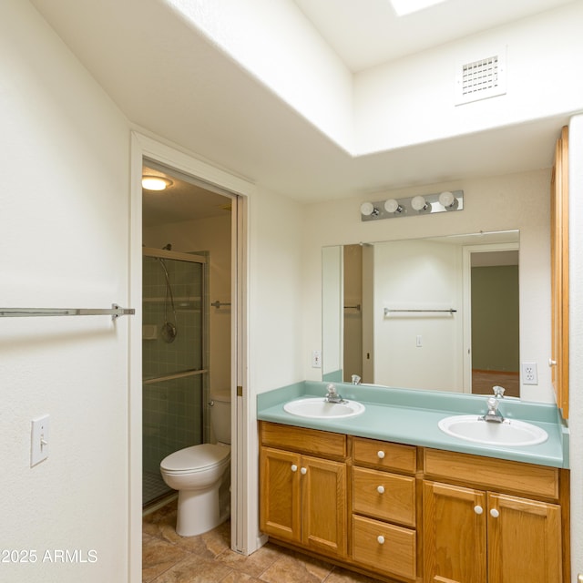 4484 Desert Springs Trl, Sierra Vista, AZ 85635 - full bathroom with toilet, double vanity, and a shower stall