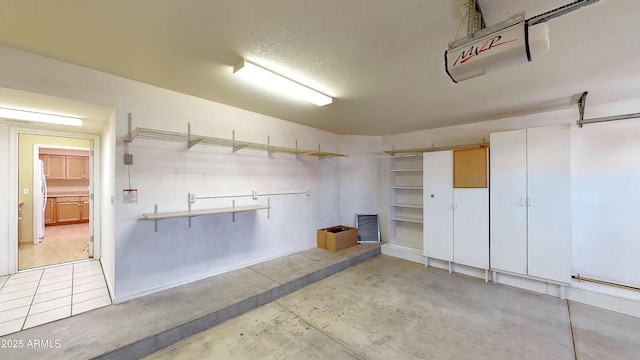 4484 Desert Springs Trl, Sierra Vista, AZ 85635 - garage with freestanding refrigerator
