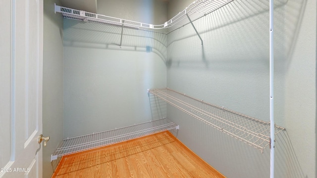 4484 Desert Springs Trl, Sierra Vista, AZ 85635 - spacious closet featuring wood finished floors