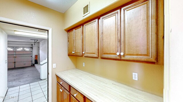 4484 Desert Springs Trl, Sierra Vista, AZ 85635 - kitchen featuring light tile patterned flooring and light countertops