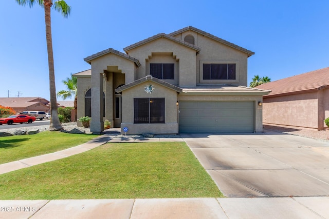 4331 E Redwood Ln, Phoenix, AZ 85048 - view of front of home with stucco siding, an attached garage, a front lawn, driveway, and a tiled roof