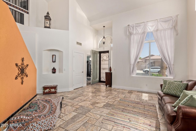 4331 E Redwood Ln, Phoenix, AZ 85048 - entryway featuring stone tile flooring and a high ceiling