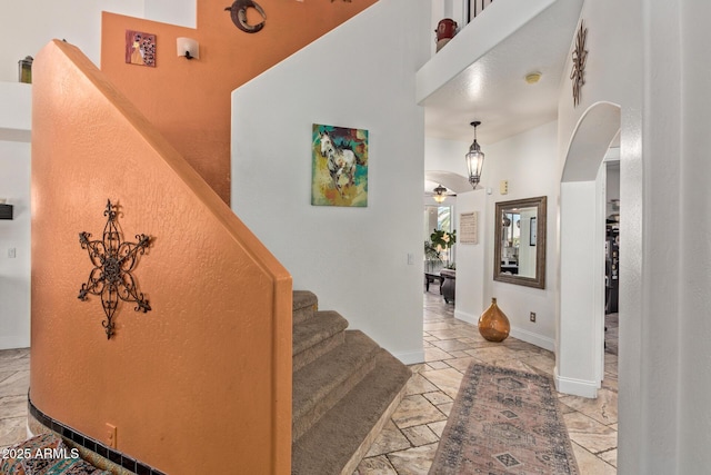 4331 E Redwood Ln, Phoenix, AZ 85048 - stairs featuring arched walkways and a towering ceiling