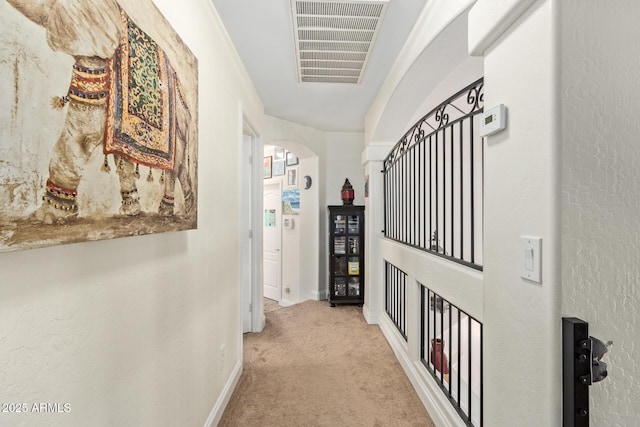 4331 E Redwood Ln, Phoenix, AZ 85048 - hall with carpet floors and arched walkways