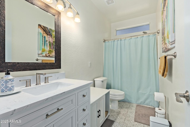 4331 E Redwood Ln, Phoenix, AZ 85048 - bathroom featuring vanity, curtained shower, tile patterned floors, and a textured wall