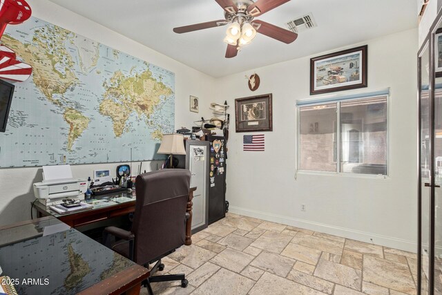 4331 E Redwood Ln, Phoenix, AZ 85048 - office area featuring a ceiling fan and stone tile flooring