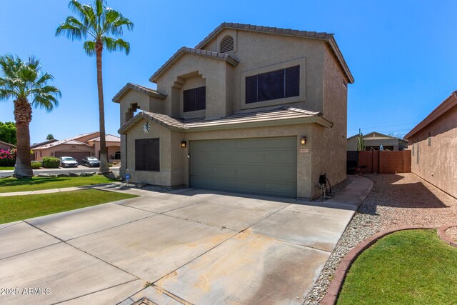 4331 E Redwood Ln, Phoenix, AZ 85048 - traditional-style house featuring stucco siding, an attached garage, a tile roof, and concrete driveway