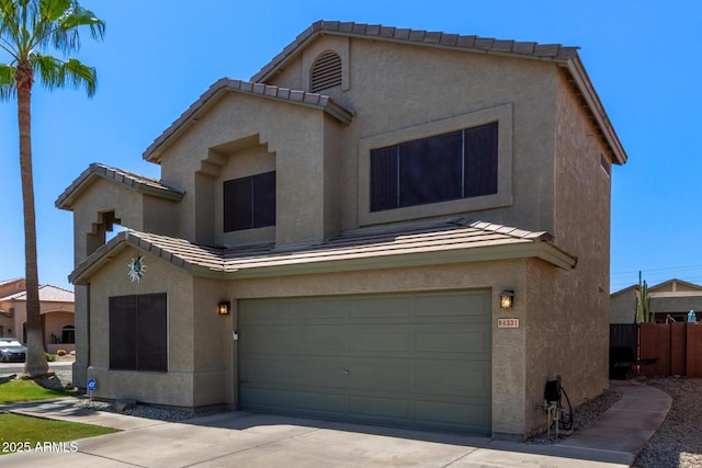 4331 E Redwood Ln, Phoenix, AZ 85048 - view of front of home with stucco siding, an attached garage, a tiled roof, driveway, and a standing seam roof