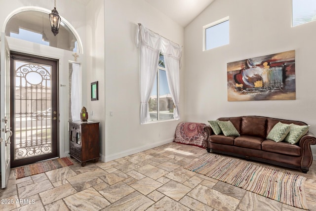 4331 E Redwood Ln, Phoenix, AZ 85048 - foyer with high vaulted ceiling and stone tile floors