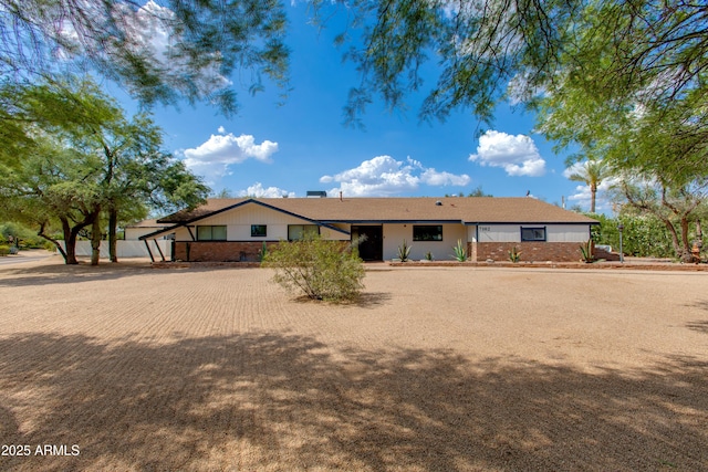 7102 E Kalil Dr, Scottsdale, AZ 85254 - ranch-style house featuring brick siding
