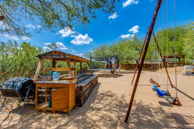 7102 E Kalil Dr, Scottsdale, AZ 85254 - communal playground featuring a trampoline and a gazebo