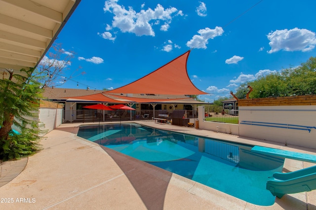 7102 E Kalil Dr, Scottsdale, AZ 85254 - view of pool with a patio area, a fenced backyard, and a water slide
