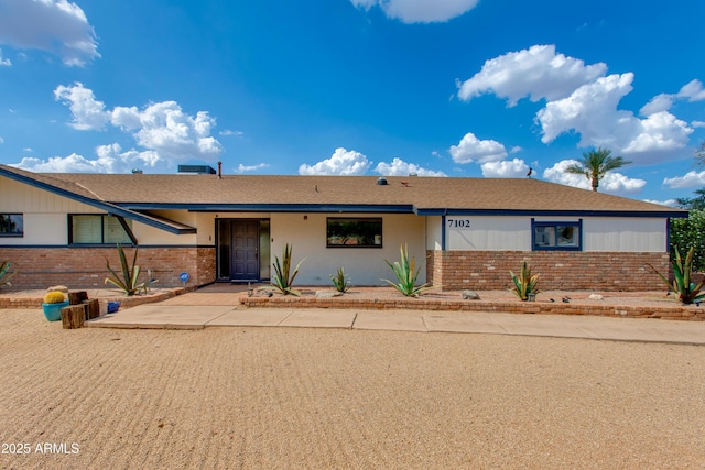 7102 E Kalil Dr, Scottsdale, AZ 85254 - single story home with brick siding