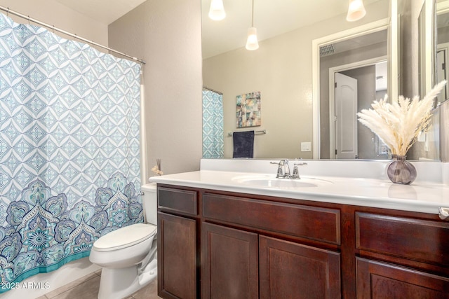 full bathroom with visible vents, a shower with shower curtain, vanity, and toilet