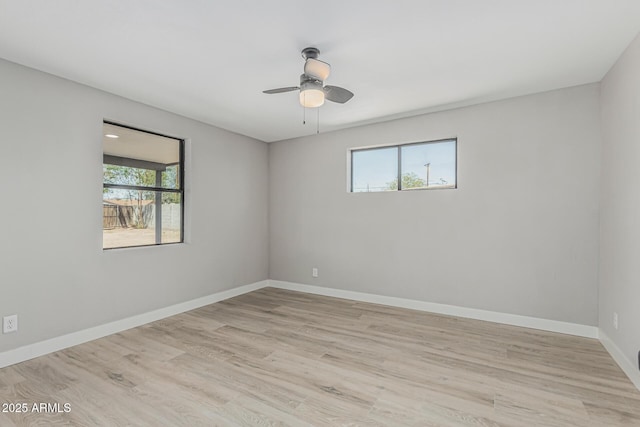 4441 N 27th Dr, Phoenix, AZ 85017 - empty room with plenty of natural light, light wood-type flooring, baseboards, and a ceiling fan