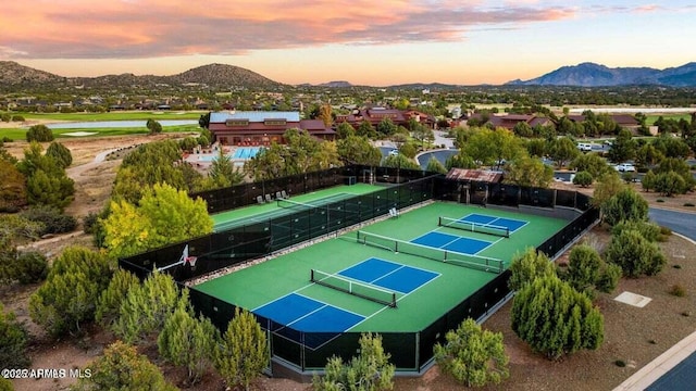 aerial view at dusk with a mountain view