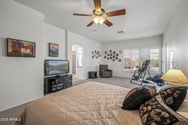 carpeted bedroom with ceiling fan