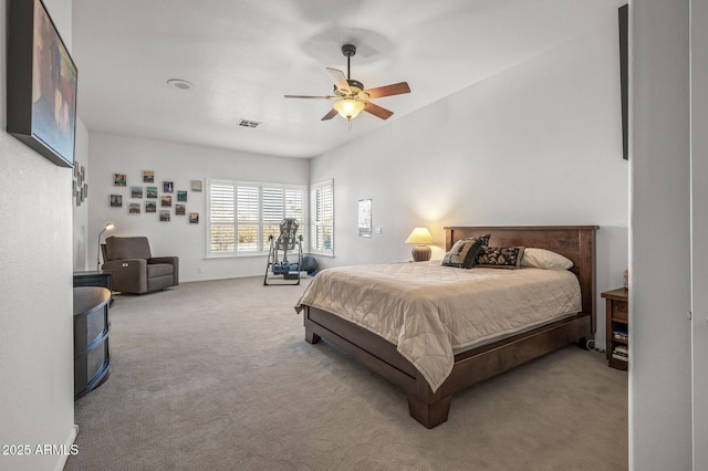 carpeted bedroom with ceiling fan