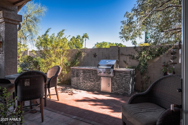 view of patio with area for grilling