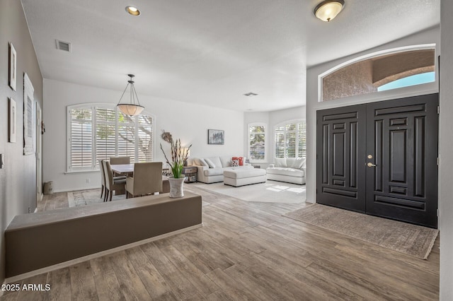 entrance foyer featuring light wood-type flooring