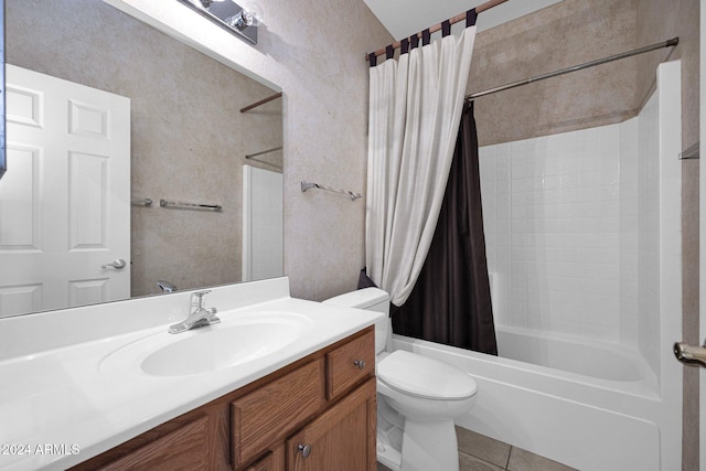 full bathroom featuring vanity, shower / bath combo with shower curtain, toilet, and tile patterned floors