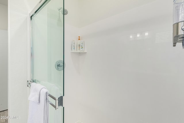 bathroom with an enclosed shower