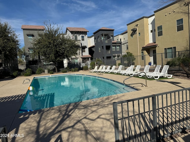 view of swimming pool with a patio