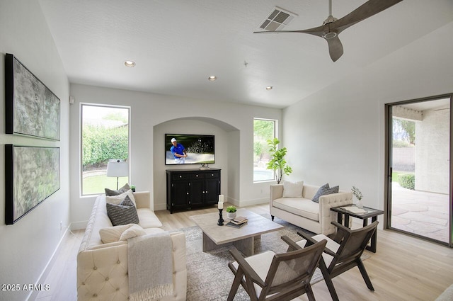 7214 E Rustling Pass, Scottsdale, AZ 85255 - living room with light wood finished floors, a ceiling fan, recessed lighting, and baseboards