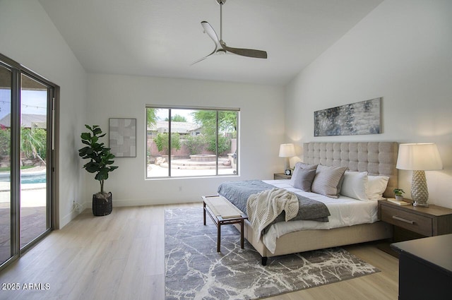 7214 E Rustling Pass, Scottsdale, AZ 85255 - bedroom with vaulted ceiling, access to outside, wood finished floors, a ceiling fan, and baseboards