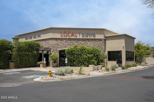 7214 E Rustling Pass, Scottsdale, AZ 85255 - view of building exterior featuring uncovered parking