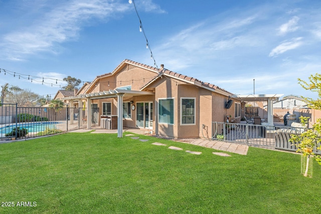 back of property featuring a patio area, a fenced backyard, a pergola, and stucco siding